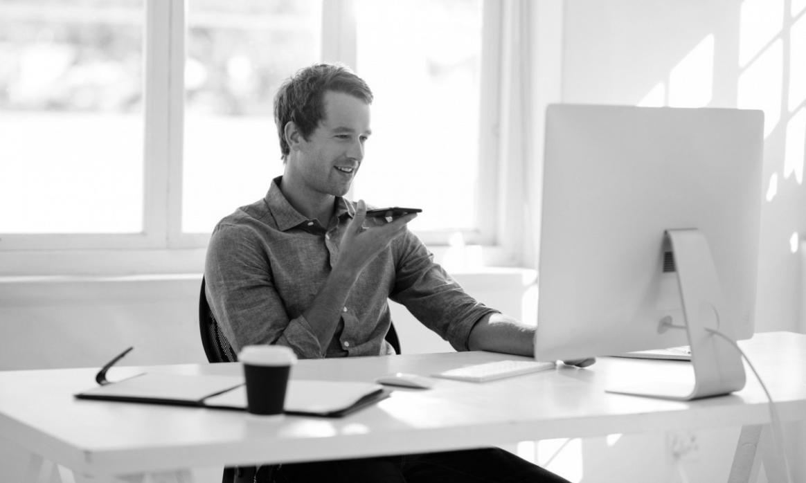 Product photography workspace with professional lighting equipment and camera setup
